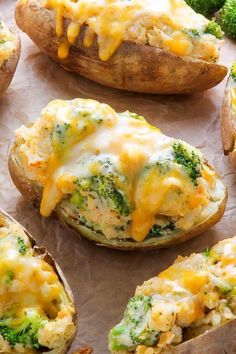 baked potatoes with cheese and broccoli on them