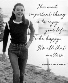 a man and woman walking on the beach next to each other with an inspirational quote above them