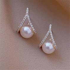 Gender:Women's; Gemstone:Pearl; Quantity:1 Pair; Theme:Precious; Shape:Geometric; Style:Stylish,Romantic; Width of Earrings:-; Jewelry Type:Fine Jewelry,Stud Earrings; Occasion:Gift,Festival; Material:Copper; Length of Earrings:-; Design:Classic; Features:Cool,Lovely; Front page:WE; Listing Date:11/10/2023 Glitter Stud Earrings, Romantic Earrings, Cheap Wedding Dresses Online, Cheap Earrings, Melbourne Cup, Jewelry Boutique, Online Wedding Dress, Pearl Stud Earrings, Bridal Jewelry Sets