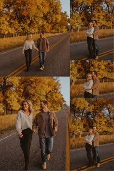 a man and woman walking down the road in front of trees with yellow leaves on them