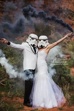 a bride and groom dressed up as stormtroopers