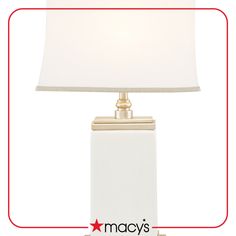 a white lamp with a red border around it and the words macy's below it