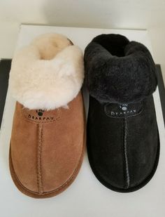 BEARPAW " LOKI II " Sheepskin Suede Logo Slippers   The BEARPAW® Loki is a plush way to start your day.  These slippers feature soft suede uppers with a sheepskin collar that is easy to maintain and offers the utmost in comfort.  Our sheepskin lining regulates body temperature to keep your feet warm, and the sheepskin footbed provides additional softness and reduces foot fatigue.  The durable rubber outsole makes this the perfect indoor/outdoor choice.  Available in whole sizes only. If between sizes, order a ½ size up. Made in China   As all our merchandise, these shoes are 100% authentic.  Imported.    They are brand new and come in an original Bearpaw box.  The following sizes are available:  US  7   8    HICKORY  US   7   8    9  BLACK  OVERNIGHT SHIPPING IS AVAILABLE AT EXTRA CHARGE!! I Love Shoes, Body Temperature, Soft Suede, Brown Suede, Slide Slipper, Loki, Black And Brown, Indoor Outdoor, To Start