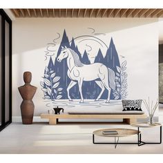 a horse in the woods wall decal on a white wall with blue trees and mountains behind it