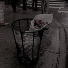 a trash can that has been covered in blood