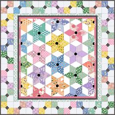 a colorful quilt with many different colors and patterns on the front, along with black dots