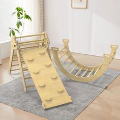 a child's wooden slide and play set in a living room