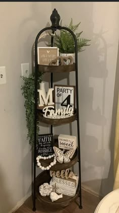 a corner shelf with various items on it in a room next to a toilet and window