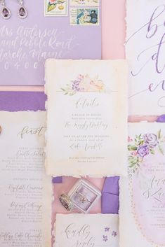 the wedding stationery is laid out on top of each other, including an envelope and ring