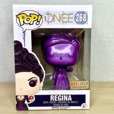 the pop vinyl figurine is in its purple box with an evil look on it's face