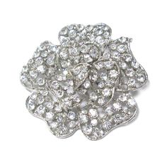 Unique and elegant, this crystal rhinestone brooch exudes glamorous charm. Features high quality crystal rhinestone on a luxurious ribbon style brooch base. Ring Bearer Pillow Lace, Paper Lanterns Party, Lace Ring, Pearl Pin, Diy Wedding Bouquet, Rhinestone Bow, Crystal Brooch, Flower Jewelry, Crystal Flower