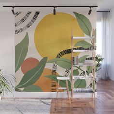 a room with a large wall mural on the wall and a chair next to it