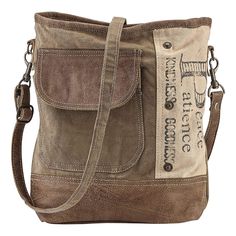 PRICES MAY VARY. CARRY YOUR STYLE: Each Upcycled Canvas Shoulder Bag is unique. The inspirational words “Peace, Patience, Kindness, Goodness” are printed on the copper-studded panel of this rustic tote bag. SUSTAINABLE FASHION: This one-of-a-kind bag is crafted of distressed canvas from repurposed tents and tarps with faux-leather trim. PRACTICAL FEATURES: Tote includes a fully lined interior with zip closure. Exterior features a front flap pocket and a zippered pocket on the opposite side. Bag Bohemian Handbags, Boho Tote Bag, Boho Handbags, Boho Tote, Brown Tote Bag, Romantic Fantasy, Boho Purses, Brown Tote, Brown Purses