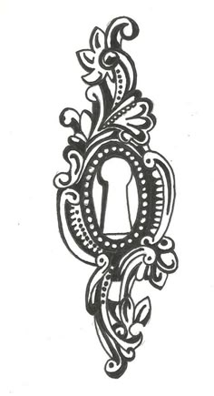 an ornate design with a keyhole in the center and flowers on it, as well as