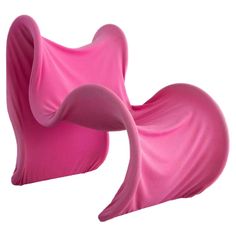 two pink chairs sitting next to each other