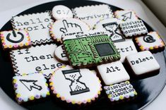 a plate with cookies decorated like electronic components