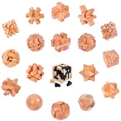 a collection of wooden puzzles arranged in different shapes and sizes on a white background