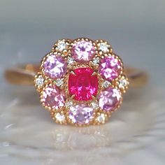 A beautiful and unique pink neon spinel ring, created in double halo hydrangea settings to create a luxurious and high-quality piece of jewelry, perfect to express your love. 💎 PREMIUM RING -- A brand new spinel ring, personally designed and made with the highest quality of 14K rose gold. It is designed ✨ CLASSIC BRILLIANCE -- Designed with a beautiful neon Jedi pink spinel at the center and chunky baby pink spinels for its side, producing a rich piece of jewelry with classic brilliance. ❇️ EXQ Formal Pink Flower-shaped Rings, Luxury Pink Ruby Ring With Halo Setting, Luxury Pink Ruby Ring For Formal Occasions, Pink Sapphire Ring With Halo Setting For Formal Occasions, Pink Ruby Ring With Accent Stones For Formal Occasions, Luxury Pink Ruby Diamond Ring, Luxury Pink Ruby Ring With Diamond, Formal Pink Ruby Ring With Accent Stones, Pink Diamond Ring With Halo Setting For Formal Events