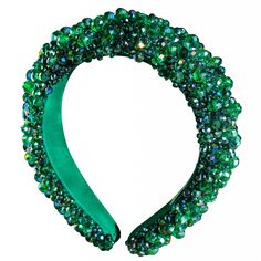 Take your look to the next level with BrunnaCo's exquisite Crown Glass Crystal Headband. This stunning accessory features a lush emerald green color that adds a touch of sophistication to any outfit. The intricate arrangement of faceted glass beads catches the light and sparkles with every movement, making it the perfect finishing touch for any special occasion.  The headband is meticulously crafted with high-quality materials, including soft, plush cushioning that ensures a comfortable fit. Each bead is carefully sewn onto the platform, creating a luxurious, dimensional look that's sure to turn heads. Whether you're dressing up for a formal event or simply want to add some sparkle to your everyday look, the Crown Glass Crystal Headband is a versatile and elegant choice. Composition: 100% Beads Headband, Sparkle Headband, June Birthstone Jewelry, Beaded Headband, Crystal Headband, Zodiac Jewelry, Crown Headband, Wedding Tiara, Jewelry Ring Box