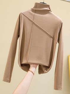 Need to warm your body during this winter, this fashionable item is for you. Do you wanahavit?Size S: Shoulder:36cm Bust Size:86cm Length:65cm Sleeve Length:55cmM: Shoulder:37cm Bust Size:90cm Length:66cm Sleeve Length:56cmL: Shoulder:38cm Bust Size:94cm Length:67cm Sleeve Length:57cmXL: Shoulder:39cm Bust Size:98cm Length:68cm Sleeve Length:58cm2XL: Shoulder:40cm Bust Size:102cm Length:69cm Sleeve Length:59cmSize mearsured by ourselves,sometimes has some errors, but always within 3cm."- ": refe Womens Basic Tops, Winter Turtleneck, Estilo Fitness, Winter T Shirts, Ladies Tee Shirts, Winter Tops, Solid Clothes, Fashion Korean, Cotton Blouse