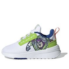 a white and green sneaker with cartoon characters on it