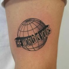 the world is yours tattoo on the thigh