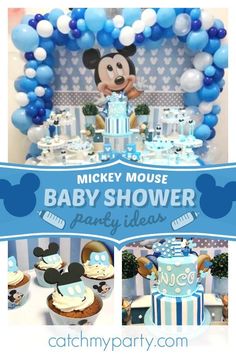 mickey mouse baby shower party with blue and white balloons, cupcakes and cake