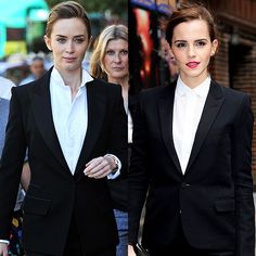 two women in suits walking down the street