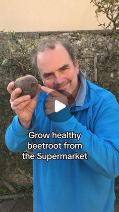 a man holding up a piece of food in his hand with the caption grow healthy beetroot from the supermarket