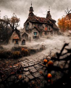 an old house surrounded by fog and autumn trees with oranges in the foreground