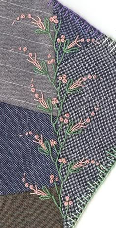 three pieces of fabric with flowers and leaves on them, all in different shades of blue