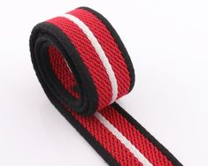 a red and white striped tie on a white background