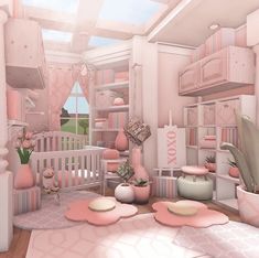 a baby's room decorated in pink and white