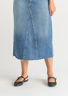 Let us introduce you to the denim skirt you'll want to wear with everything, the Lee A-Line Raw Hem Midi Skirt! This stunning midi denim skirt is an Inherit Design made in the USA! Crafted from high quality, stretchy, medium wash denim that is super soft and will keep you comfortable all day long. The A-line fit is walkable, modest, and on-trend with a raw hem. This sustainable, modest, American-crafted skirt is a true seasonless staple you will wear for years to come! Style | Midi, Denim Color Spring High-rise Dark Wash Denim Skirt, Dark Wash Straight Leg Skirt For Spring, Spring Relaxed Straight Leg Skirt, Spring Straight Leg Dark Wash Skirt, Spring Dark-wash Denim Skirt, Spring Dark Wash Denim Skirt, Casual Medium Wash Denim Midi Skirt, Denim Skirt For Spring, Trendy Midi-length Denim Skirt For Spring