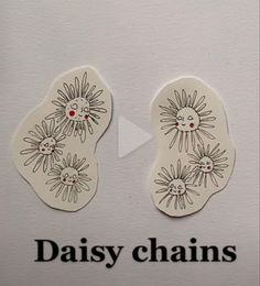 two pairs of shoes with daisies drawn on them and the words daisy chains written below