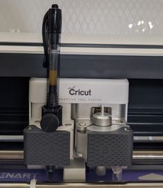 an electronic device is on display in a store or showroom, with the words circuit above it