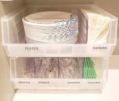 plastic storage bins filled with different types of items