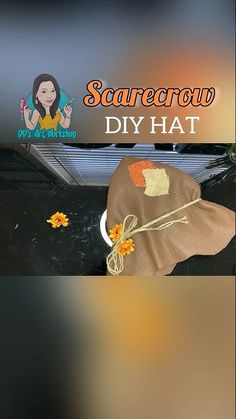 there is a hat with flowers on it and the words scarecrow diy hat