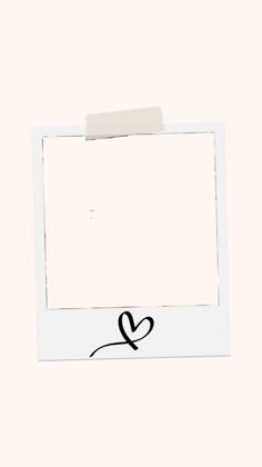 a white photo frame with a heart drawn on the side and a piece of paper attached to it