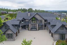 an aerial view of a large house with lots of windows