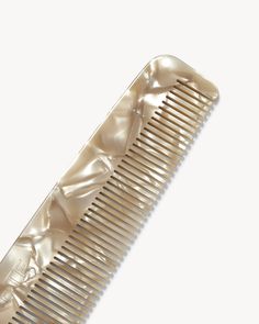 A tapered fine-tooth comb, handmade from Italian acetate. Recommended for fine or straight hair. Fine Tooth Comb, Hoop Charms, Color Textures, Color Collection, Jewelry Earrings Hoops, Straight Hair, Hair Claw, Aviator Sunglasses, Eyewear Sunglasses