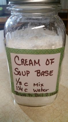 a jar filled with white stuff sitting on top of a table