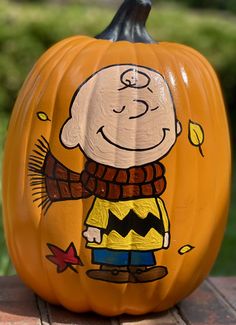 a pumpkin with a cartoon character painted on it