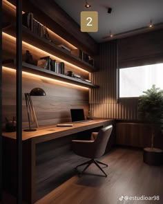 a desk with a laptop on top of it in front of a book shelf filled with books