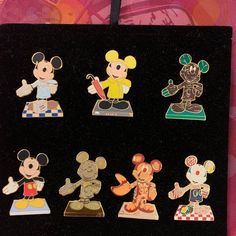 the mickey mouse pin collection is on display