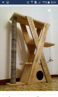 the cat tree is made out of wood