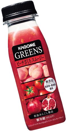 a bottle of red juice with pomegranate on it