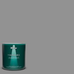 a white paint can with the words marjoie on it and a blue tin