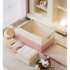 a baby crib with stuffed animals and toys on the floor