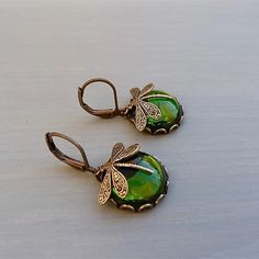 Gender:Women's; Quantity:2pcs; Theme:Dragonfly; Shape:Oval; Style:Cool,Vintage; Width of Earrings:-; Jewelry Type:Earrings; Occasion:Party,Wedding; Material:Chrome; Length of Earrings:-; Design:Vintage Style; Features:Lovely,Cool; Front page:WE; Listing Date:06/16/2023 Moonstone Drop Earrings, Vintage Dragonfly, Women Jewellery, Dragonfly Earrings, Alloy Earrings, Bee Earrings, Moonstone Earrings, Gold Colour, Cool Vintage